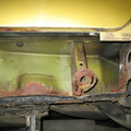 rusty rear sill end passenger side